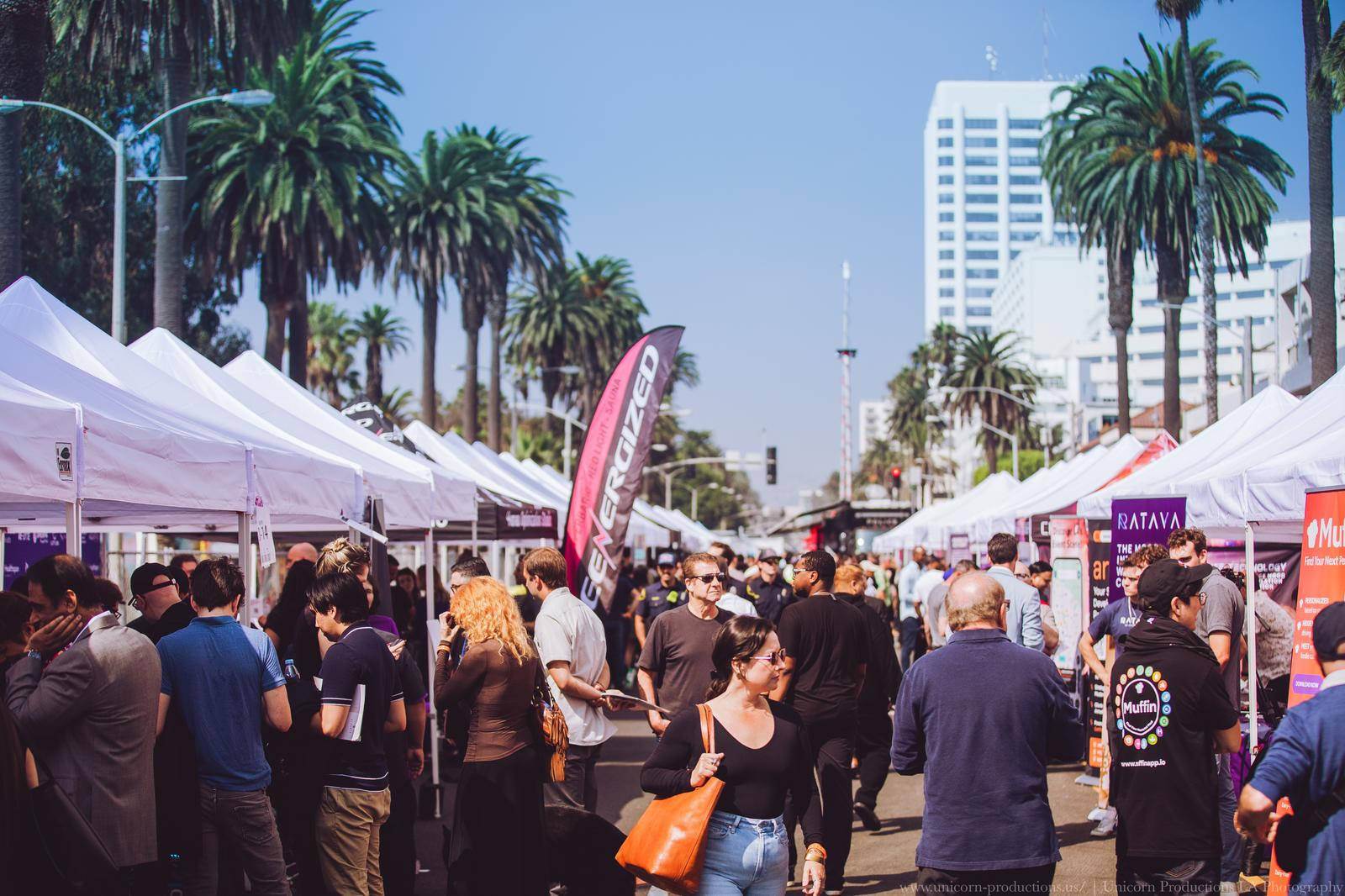 ReEnergized Long Beach client claiming a free wellness session, showcasing premium recovery and rejuvenation therapies in a modern wellness center